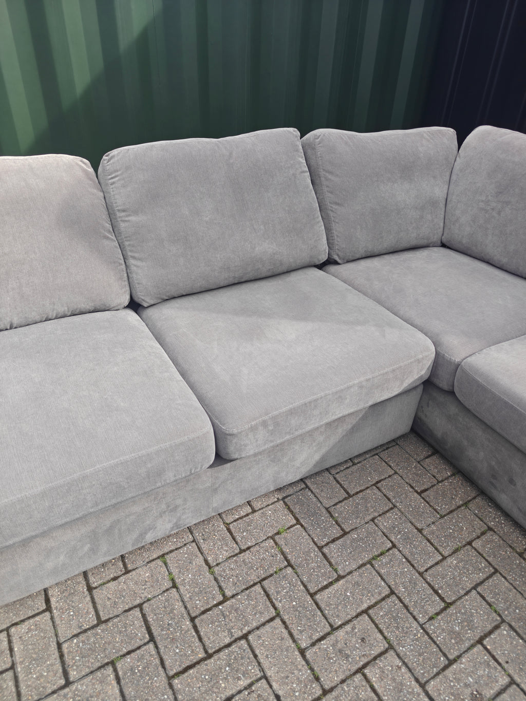 Grey DFS Orka Corner Sofa - With sun fade