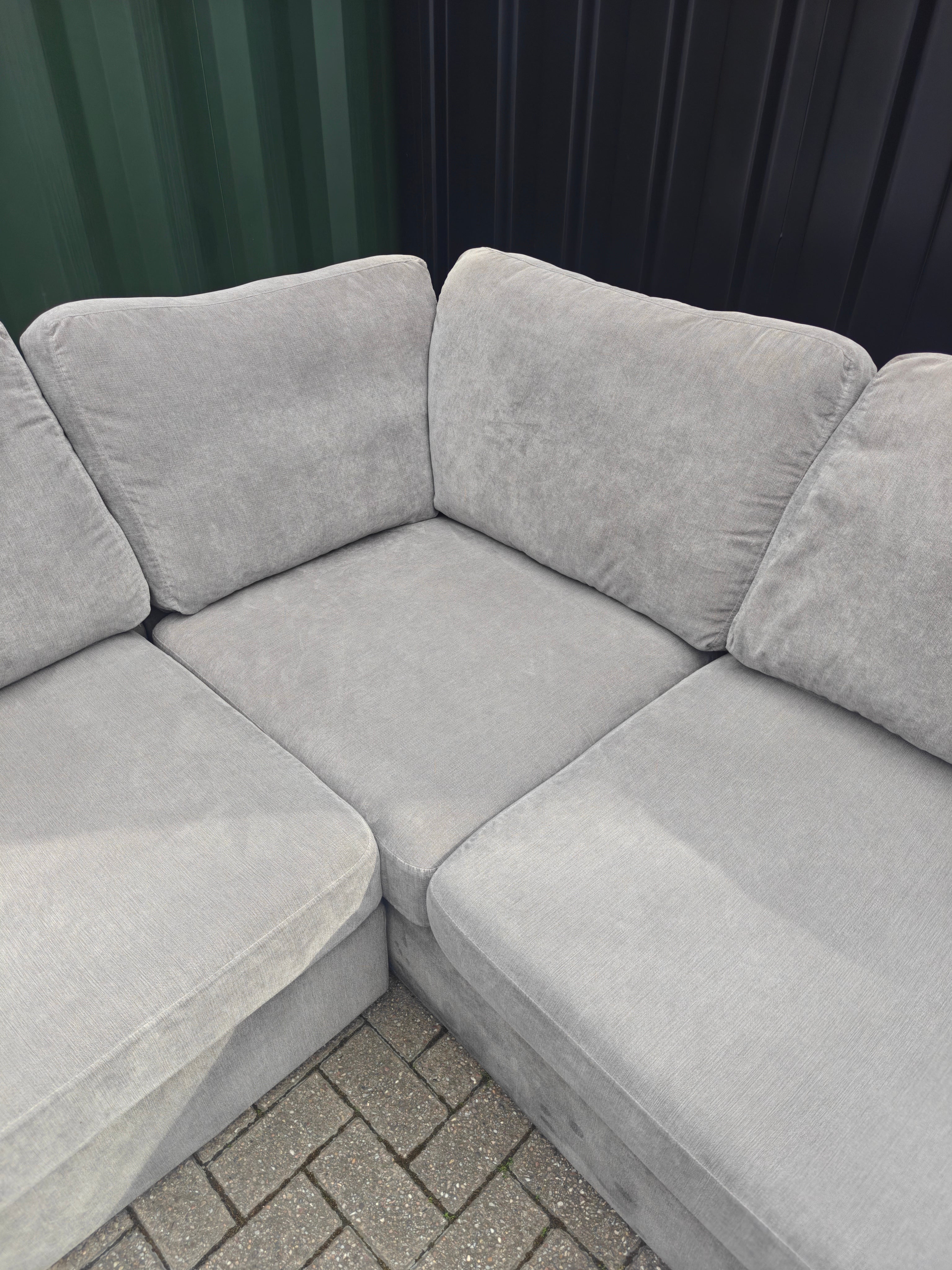 Grey DFS Orka Corner Sofa - With sun fade