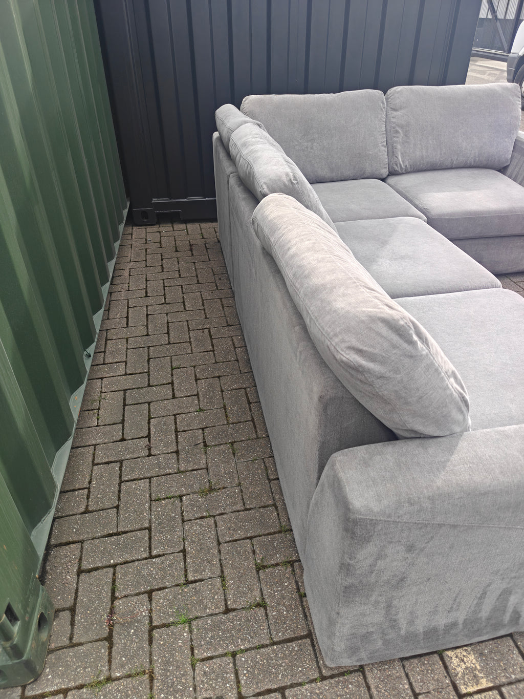 Grey DFS Orka Corner Sofa - With sun fade